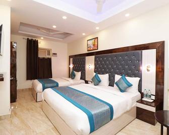 Shivaka Inn Residency Delhi Airport - 新德里 - 臥室