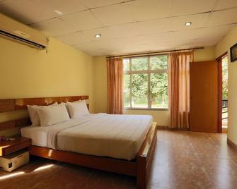 Spring Valley Resort - Guwahati - Bedroom