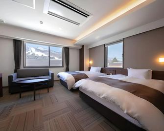 Hotel Munin Furano - Furano - Спальня