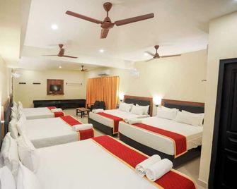 Hotel Sri Devi - Kanyakumari - Спальня