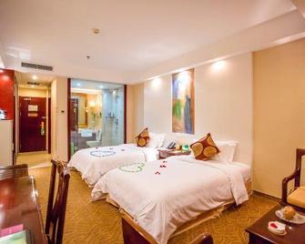 Linghai Hotel - Rizhao - Спальня