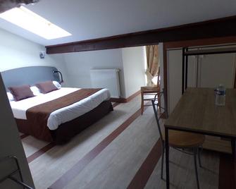 Hotel De France - Rochechouart - Schlafzimmer