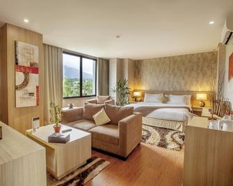 بادجادجاران سويتس ريزورت آند كونفينشن - بوجور - غرفة نوم