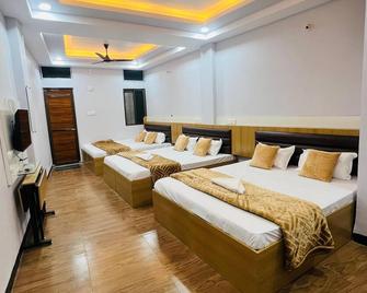 Hotel Advika Ujjain - אויאיין - חדר שינה