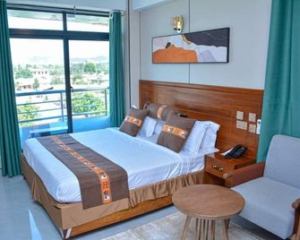 Unique Royal Hotel And Suites - Dodoma - Habitación