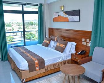 Unique Royal Hotel And Suites - Dodoma - Habitación