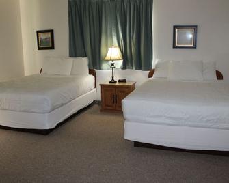 American Host Inn - Hart - Habitación