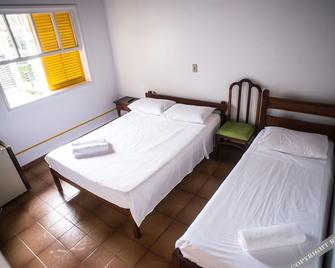 Hotel e Pousada Pouso54 - Ubatuba - Bedroom