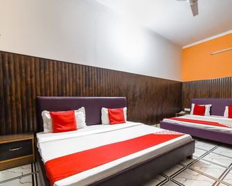 Hotel Royal Dreams - אמריצר - חדר שינה