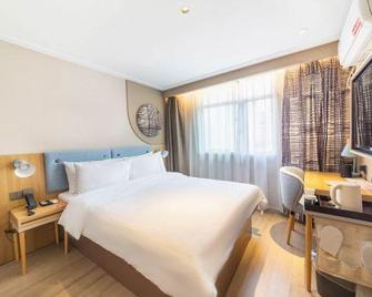 Home Inn (Bengbu Chaoyang Road Wanda Plaza) - Bengbu - Спальня