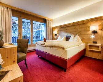 Alpina - Arosa - Schlafzimmer