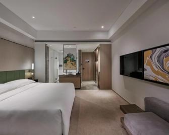Empark Grand Hotel Kunming - Kunming - Bedroom