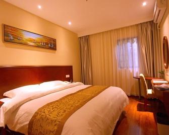 Greentree Inn Nanjing Shanxi Road Cloth City Business Hotel - Nanchino - Camera da letto