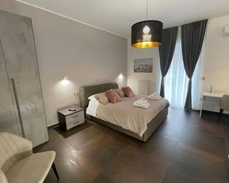 ريليه بيتروتسيلي - باري - غرفة نوم