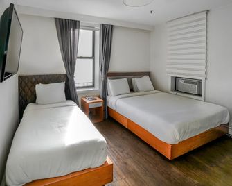 ميد تاون ويست هوتل - نيويورك - غرفة نوم