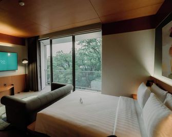 Jiro Hotel - Bandung - Bedroom
