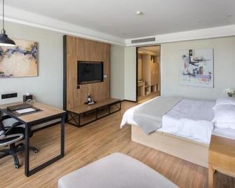 Greentree Eastern Yancheng Administration Center Hotel - Yancheng - Schlafzimmer