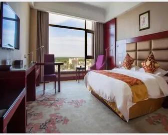 Dunhuang Silk Road Yiyuan Hotel - Jiuquan - Bedroom