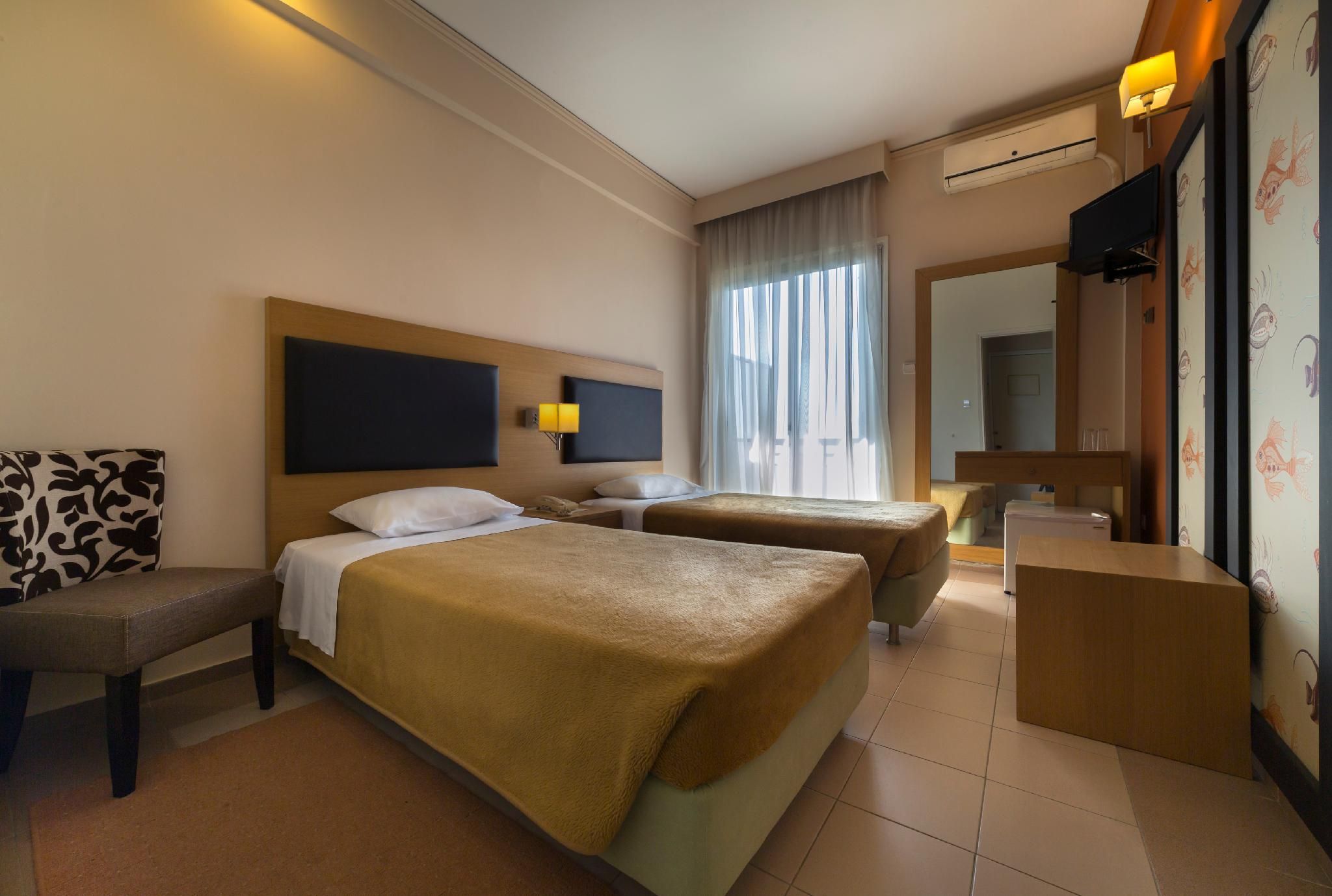 Delfini Hotel - פאטראס - חדר שינה