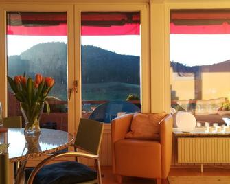 Let your mind wander in the Northern Black Forest with a sensational panorama of the Murgtal - Baiersbronn - Living room