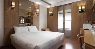 Charis Hotel - Incheon - Schlafzimmer