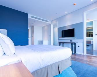 Holiday Inn Express Harbin Qunli By IHG - Harbin - Bedroom