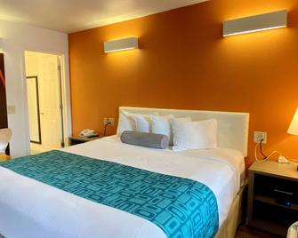 هاورد جونسون باي ويندام ليك جورج - لاكي جورج - غرفة نوم