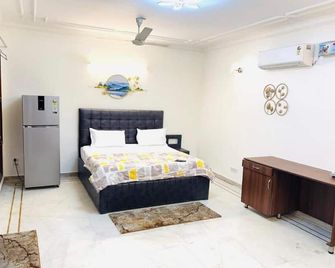 Fortune Home Service Apartment, Studio E-30 - Neu-Delhi - Schlafzimmer