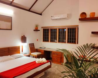 Nellu - Tranquil Pool Villa & Organic Farmstay near Varkala - Thiruvananthapuram - Schlafzimmer