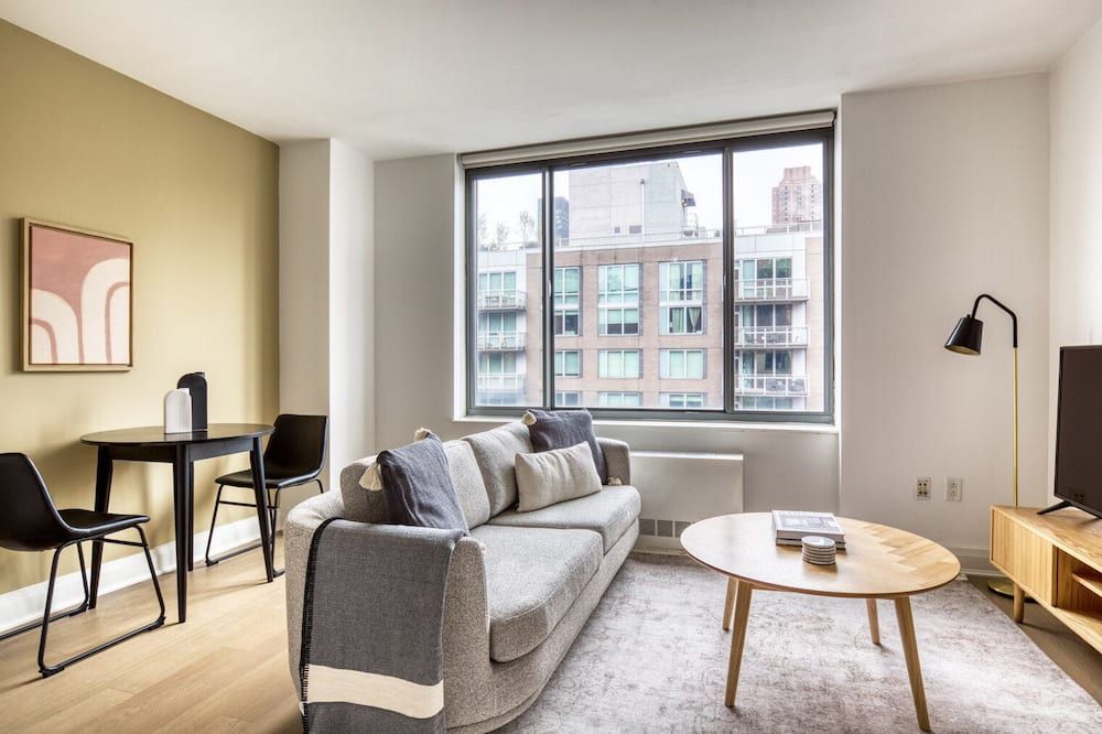 Hip Kips Bay 1BR w/ Gym & Doorman nr Empire State Building, by Blueground - نيويورك - غرفة معيشة