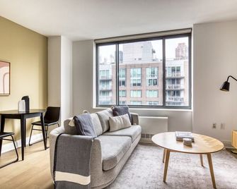 Hip Kips Bay 1BR w/ Gym & Doorman nr Empire State Building, by Blueground - نيويورك - غرفة معيشة