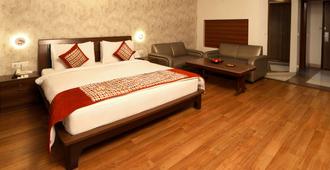 Comfort Inn Alstonia - Amritsar - Yatak Odası