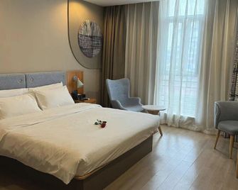 YiJia Hotel (Guang'an Jin'an Avenue Civic Square) - Guang'an - Camera da letto