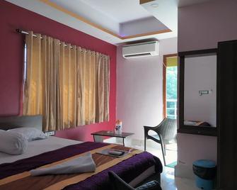 Blue Stone Hotel & Restaurant Mandarmani - Mandarmani - Спальня