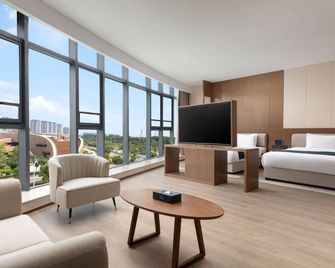Days Inn by Wyndham Linyi Yihe New Area - Linyi - Wohnzimmer
