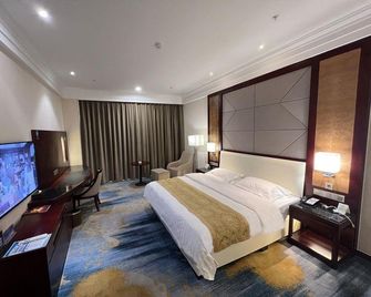Hotan West Lake International Hotel - Hotan - Camera da letto