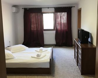 La Masion Paul de inchiriat in regim hostel & apartament - Giamata - Bedroom