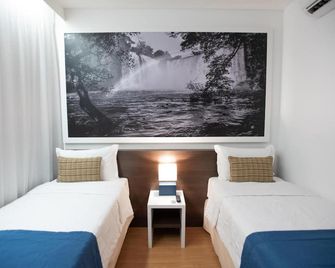 Golden Tower Aeroporto - Lizz - by Fênix Hotéis - Uberlândia - Habitación