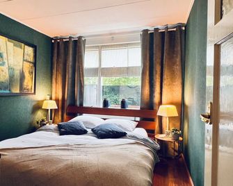 Light and Spacious Getaway House - Arnhem - Slaapkamer