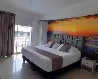 Hotel Granada Loft - Cali - Bedroom