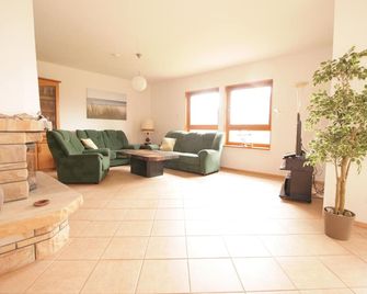 Strandhaus Donnerkeil - Ostseebad Dierhagen - Huiskamer