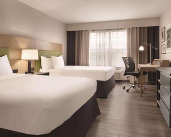 Country Inn & Suites by Radisson, Waterloo, IA - Уотерлоо - Спальня