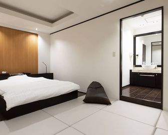 The Manga Hotel Togo - Togo - Schlafzimmer