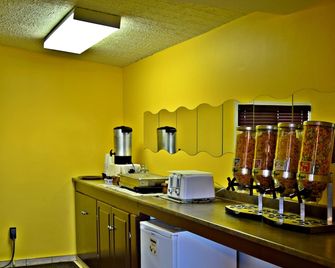 Centre Suites Inns Motel - Бонівіл - Спальня
