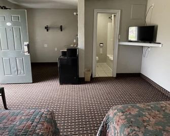 Economy Inn - Gonzales - Ložnice