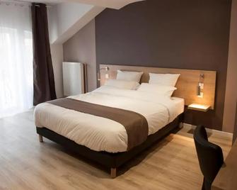 Logis Auberge Des Voyageurs - Vandières - Schlafzimmer