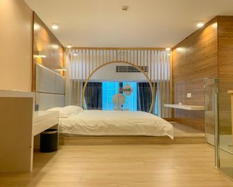 Manxin Louzhu Apartment - Фужоу - Спальня