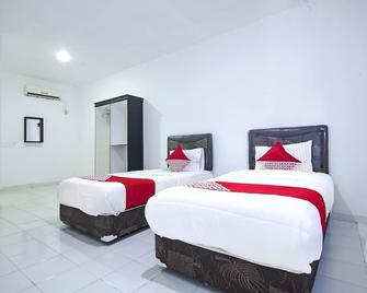 OYO 91127 Wisma Sukajadi Syariah - Prabumulih - Habitación
