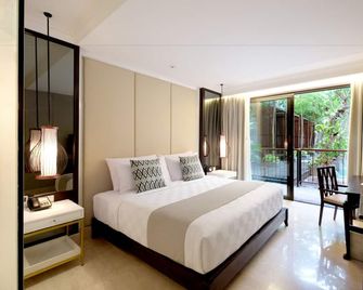 Jambuluwuk Oceano Seminyak Hotel - Denpasar - Habitación