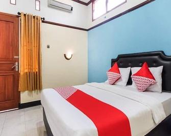 Athaya Guest House - Depok - Habitación